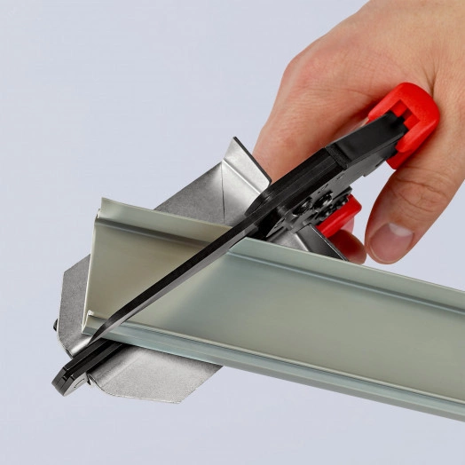 Ножницы для реза пластмассы и кабель-каналов толщиной профиля до 4 мм нож сменный 110 мм L-275 мм легкий рез за счёт специального коленчатого рычага чёрные 2-компонентные рукоятки KN-950221