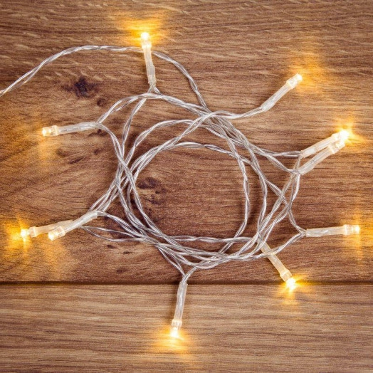 Гирлянда светодиодная универсальная 1.2м 10LED тепл. бел. 0.1Вт IP20 провод прозр. ПВХ элементы питания 2хAA (не в компл.) Neon-Night 303-073