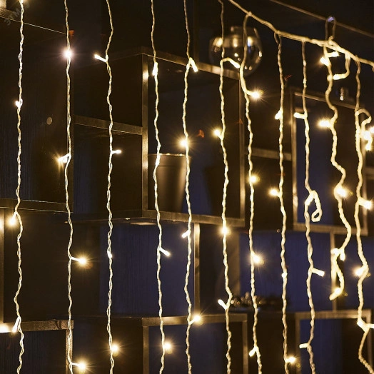 Занавес светодиодный 3х2м 160 светодиодов Теплый белый свет Провод прозрачный ULD-C3020-160/DTA WARM WHITE IP20  TM Uniel