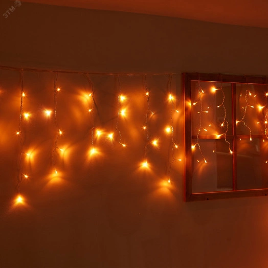 Бахрома светодиодная с эффектом мерцания 12м Соединяемая 195 светодиодов Янтарный свет Провод прозрачный ULD-B12006-195/TTK AMBER IP44  ТМ Uniel
