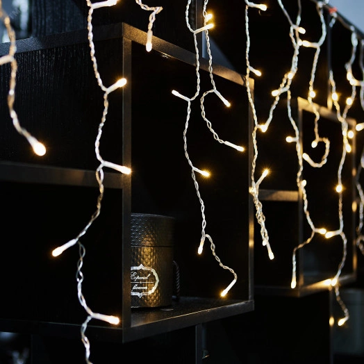 Бахрома светодиодная со статическим свечением 6м Соединяемая 200 светодиодов Теплый белый свет  Провод прозрачный ULD-B6007-200/STK WARM WHITE IP44  ТМ Uniel